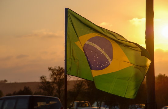 brazilian flag at sunset