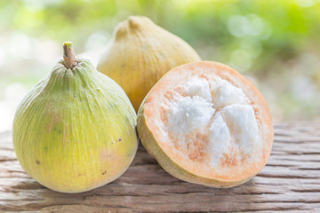 Obraz premium Santol fruit on wood