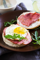 Sandwich with meat and fried egg