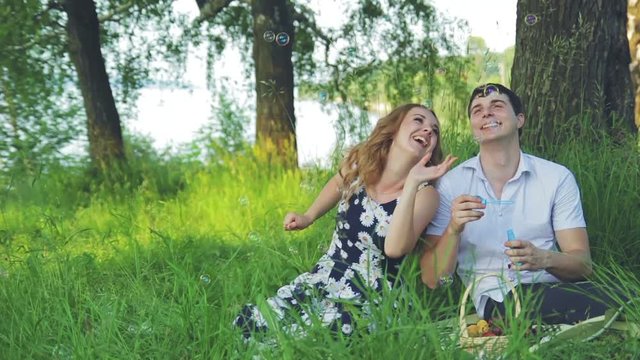 Happy couple in love at a picnic, Slow Motion