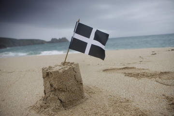 sandcastle with Cornish flag