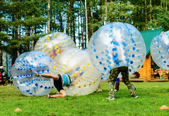 people play bumperball outdoor, Zorbsoccer