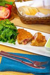 Breaded cutlet served on a plate