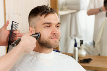 barber trimm the beard