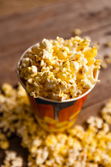 Popcorn on wooden background