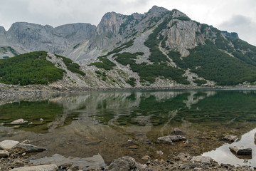 Naklejka na ściany i meble Reflection of Sinanitsa Peak in the lake, Pirin Mountain, Bulgaria