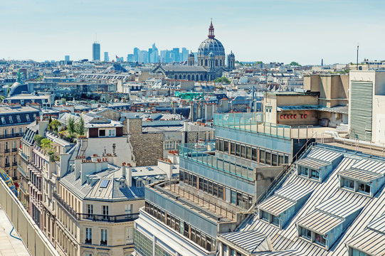 Panorama of Paris. View from Printemps store. Paris rooftops.  Beautiful view of the rooftops of Paris on a sunny day. France.