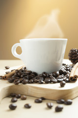 Hot espresso cup on coffee bean