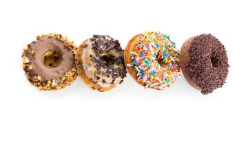 various donuts on white background