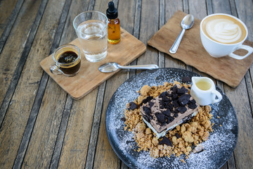 Pictures of coffee and cake,focus on cake.