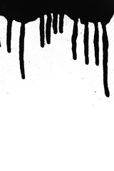 Black color spray paint on a white background paper