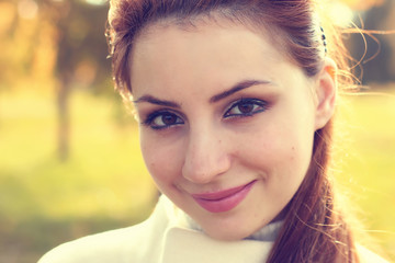 girl in a park walk autumn alone