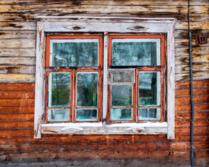 Old wooden house with window