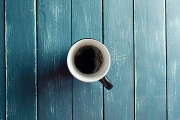 coffee mug on a dark wooden table