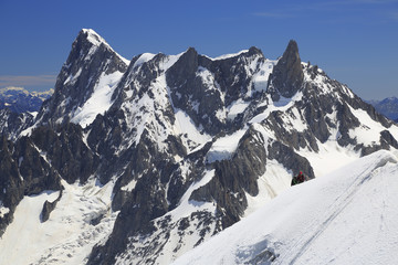 Climbers on French Alps Mountains near Aiguille du Midi, France, Europe
