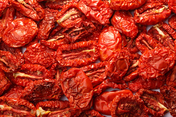 Dried tomatoes background, top view