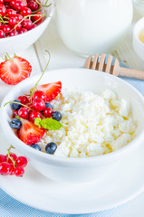Fresh cottage cheese with berries for breakfast