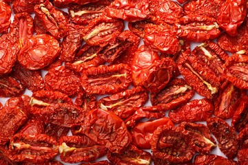 Dried tomatoes background, top view
