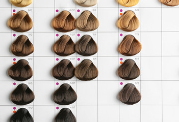 Palette of different colors to hair dye at hairdressing salon