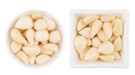 Garlic cloves in bowl from top including clipping path.