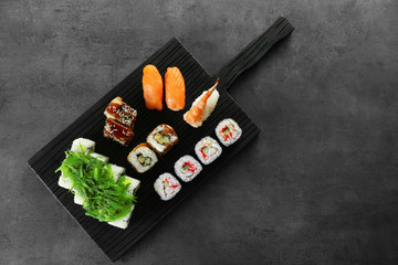 Sushi set on wooden board
