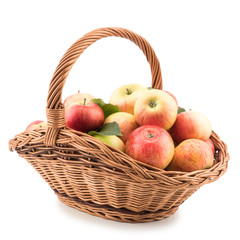 juicy apples in basket, isolated on white.