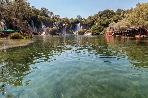 Kravica Waterfall In Bosnia And Herzegovina People Swimming