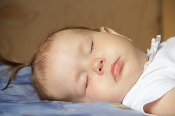 Little newborn baby girl sleeping