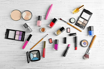 Set of decorative cosmetics on wooden background