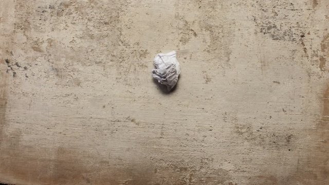 Crumpled white paper stop motion animation