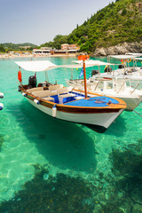 Fototapeta na wymiar crystal clear water on paradise beach in paleokastritsa on Corfu island, Greece