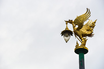 Traditional Thai-Style Light Pole With Golden Swan Statue