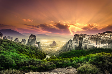 Breathtaking view of Meteora Roussanou Monastery at sunset, Greece
