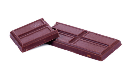 Piece of dark Chocolate isolated on white background