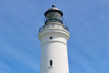 Fototapeta na wymiar Lighthouse in Hirtshals, Denmark, erected in 1863. Hirtshals is an important port town in North Jutland. Scandinavia, Europe. 