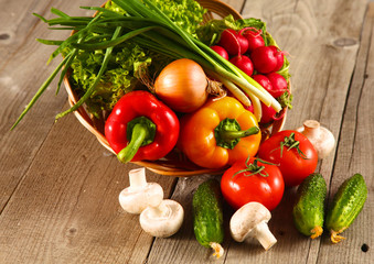 Fresh vegetables on a clean wooden table