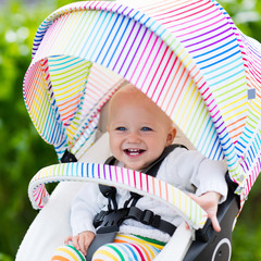 Baby in white stroller