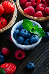 Colorful berries with mint