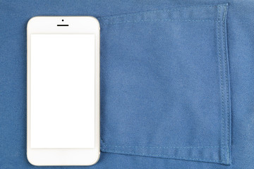 Smartphone isolated white screen on fashion blue jeans background