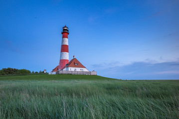Fototapeta na wymiar Lighthouse Westerhever Sand