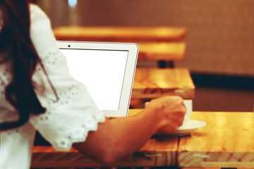 woman using laptop in coffee cafe' 