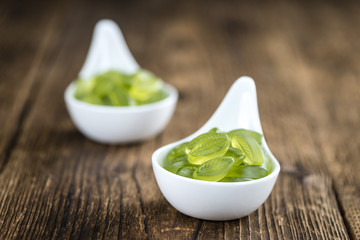 Heap of gummy candy with lime taste