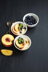 Rice pudding dessert with blueberry and peach