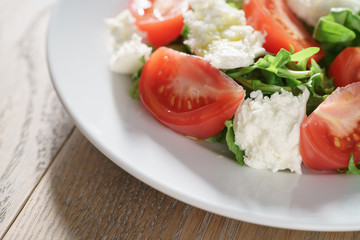 salad with tomatoes, mozzarella and rocket salad