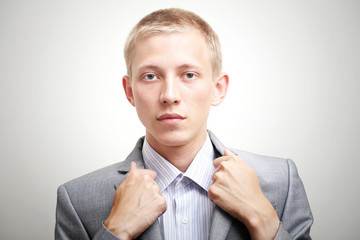 Portrait of a handsome young man looking at camera