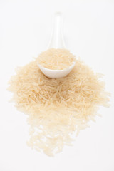 spoon of basmati rice isolated on white background