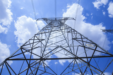 Pylon under the blue sky white clouds