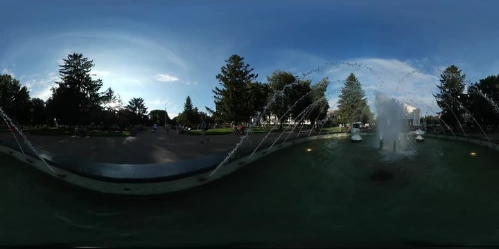 360Vr Video People Have a Rest in Park Konotop Fountain Amusement Park Kids Are Driven Children's Cars Parents Are Walking Cityscape in Sunny Summer Day