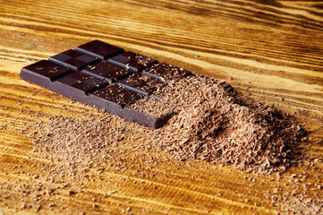 Cubes of chocolate and grated chocolate