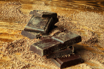 Cubes of chocolate and grated chocolate